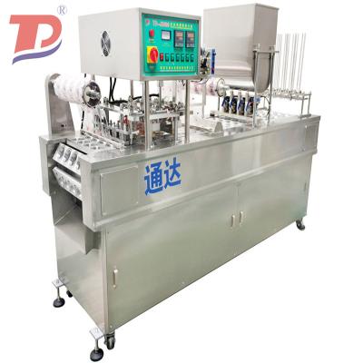 China Indonesia Line 4 And 2 Line Mechanical Water Cup Filling Sealing Beverage Machine for sale