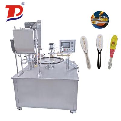 China Spoon Coating Machine Food Honey American Spnoon Filling And Sealing Sealing Machine for sale