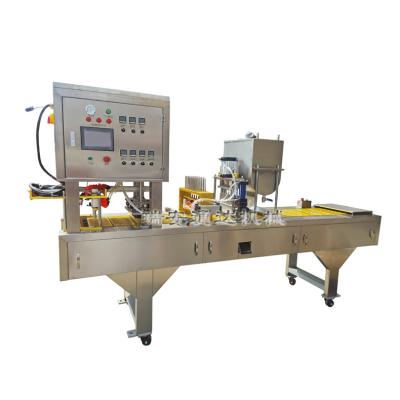 China Food Factory Producing Coating And Rotary Type Honey Spoon Filling Sealing Packing Machine for sale