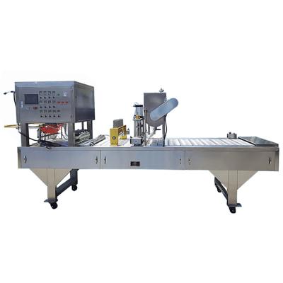 China Food Jam Spoon Packing Plant Producing Coating And Rotary Type Honey Spoon Filling Sealing Packing Machine for sale