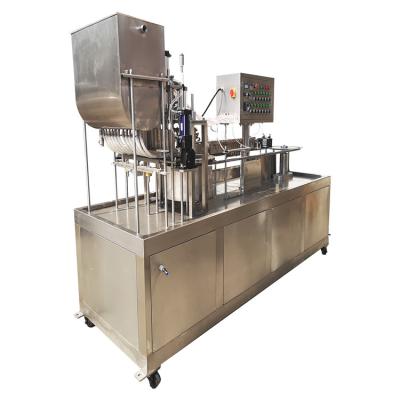 China NEW TYPE GARMENT pneumatic ice lollipop filling sealing machine. Big Lollipop Filling Sealing Machine for sale