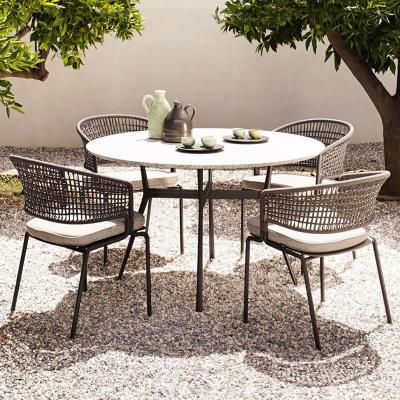 China Loop Swivel Extendable Dining Table Set Outdoor Modern Glass Dining Table Rattan Dining Set for sale