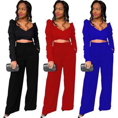 China Anti-pilling 2022 women fashion low bust crop casual ruched top and high waist loose long pants 2 piece set for sale