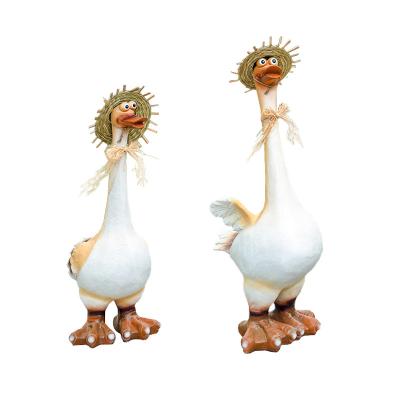 China Outdoor Funny Animal Crafts Gift Cute Resin Duck Garden Decoration Resin Duck Straw Hat Duck Garden Landscape Ornament for sale