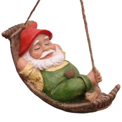 China Europe Park Resin Outdoor Decorative Craft Statue Funny Swing Leaf Hammock Hanging Fairy Gnome Sculpture for sale