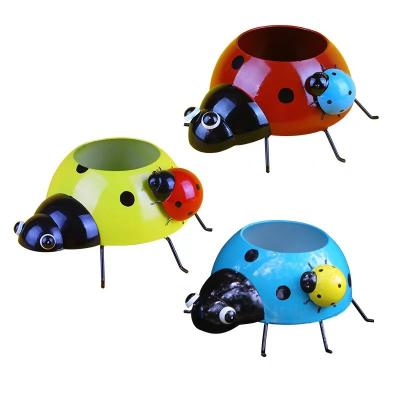 China Factory direct sale Worlwide factory direct sale park animal flower pot simulation cartoon seven star ladybug outdoor wrought iron decoration for sale