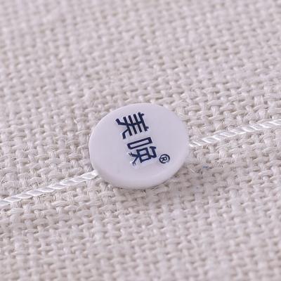 China Sustainable Name Custom Laundry Plastic Seal Tag for sale