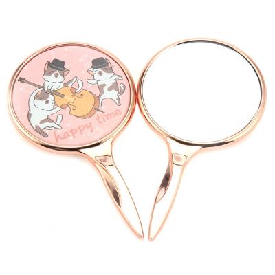 China Skyeycare Rose Gold Handheld Plastic Makeup Mirror Round Magnifying Mirror Accept Customization Handle Mirror for sale