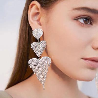 China Fashion trend news female rhinestone love earrings long multi-layer heart-shaped tassel earrings TRENDY for sale