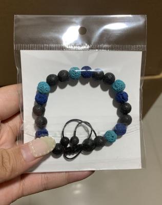 China Fashion 8mm CLASSIC Oil Diffuser Colorful Lava Stone Bead Braided Woven Bracelet for Women and Men for sale