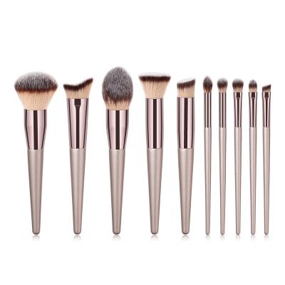 China Angular blush factory direct professional make up high end personalized makeup brush champagne gold one piece makeup brush with nylon hair for sale