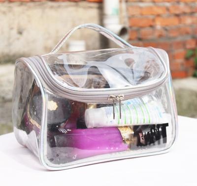 China Fashion Shape Transparent Laser Travel Makeup Bag Women Organizer Storage Beauty Make Wash Handbag Zipper Up Waterproof Cosmetic Case for sale