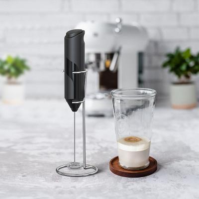 China Sustainable Portable Handheld Small Coffee Frother Milk Frother Automatic Lattes Milk Frother Maker With Base Stand for sale