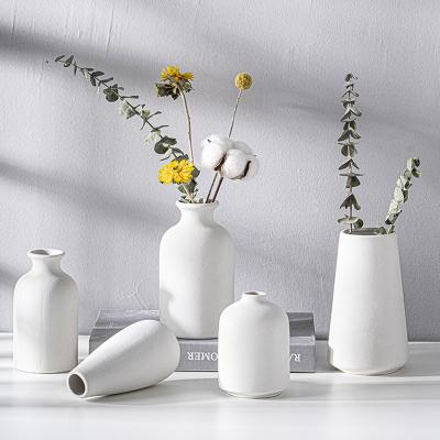 China Modern minimalist style creative ceramic porcelain cheap flower vases for home decor wedding for sale