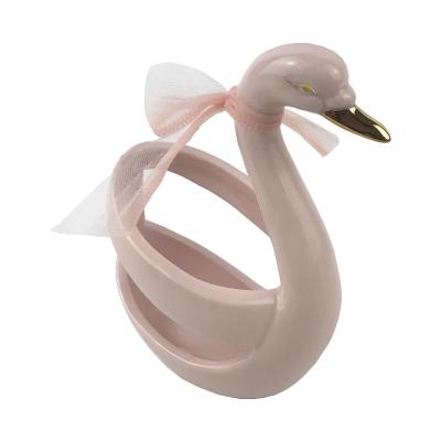 China Sustainable Pink Swan Shaped Ceramic Fork Holder Stand for sale