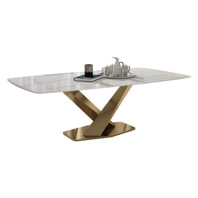 China Modern Luxury Unique Kitchen Dining Tables Rectangular Square Shaped 6 Seater Leg Slate Artificial Marble Steel Head Dining Table for sale