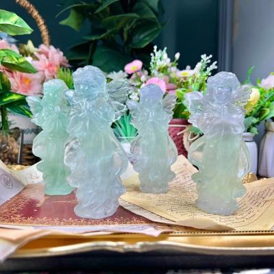 China High Quality Europe Natural Healing Crystal Hand Cut Fluorite Light Green Angel Crystal Crafts for sale