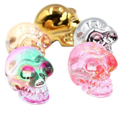 China Europe factory direct wholesale high quality 1 inch 2 inch hand cut skulls aura gemstone glass crafts for gifts decoration for sale