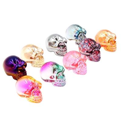 China Europe factory direct wholesale high quality 1 inch 2 inch hand cut skulls aura gemstone glass crafts for gifts decoration for sale