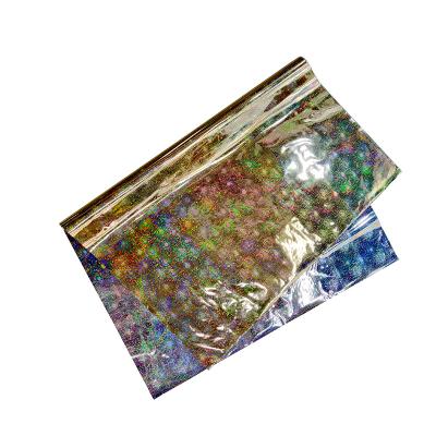 China New Foil Moisture Proof Laser Holographic Metallized Wrapping Aluminum Flower Wrapping Film For Gift Wrapping for sale