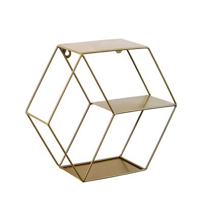 China Wall Decorative Shelf Wrought Iron Storage Grid Wall Decoration Display Rack Simple Hexagonal Storage Racks and Holders for sale