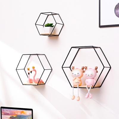 China Wrought Iron Viable Creative Wall Shelf Living Room Wall Hanging Bedroom Wall Bathroom Storage Home Decoration Hexagonal for sale