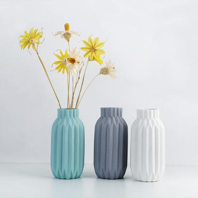 China Corrosion Resistance Ins Color Earth Matte Origami Dried Flower Vases Decor Modern Geometric Cool Ceramic Vase Small for sale