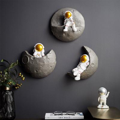 China Interior Decorations Modern Nordic Creative Astronaut 3d Stereo Wall Hanging Resin Opens Wall Home Decoration for sale