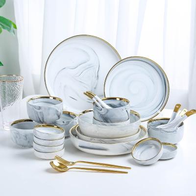 China Hot Selling Nordic Style Golden Edge Dishes And Plates Porcelain Dinnerware Sets Luxury Round Dinner Set Dinnerware for sale