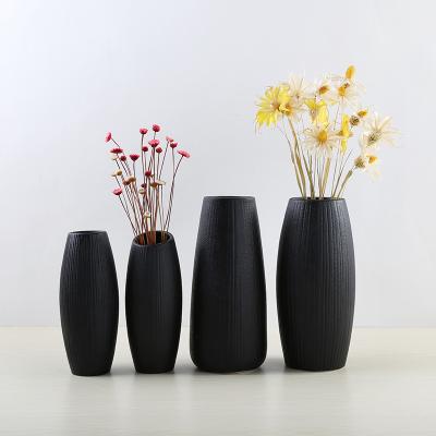 China Simple dry black office home office style vases flowers wholesale price ceramic European wine cabinet decoration accessories home office for sale