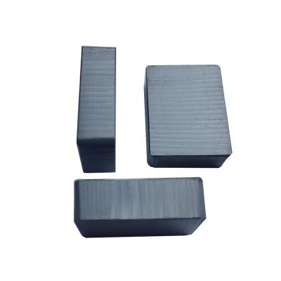 China Motorcycle magnet arc magnet segment 67.5 mm y35 ferrite magnet wholesale price ferrite speaker magnet for sale