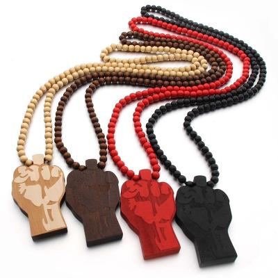 China 2021 BLM Jewelry Fist Necklace Design CLASSIC Black Beaded Chain Wooden Necklace for sale