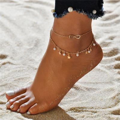 China 2022 Environmentally Friendly Double-layer Beach Tassel Anklet Star Bead Foot Link Gold Alloy Design Simple Anklet New Fashion for sale