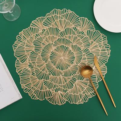 China Stocked Wedding Table Decorative Gold PVC Plastic Flower Place Mat for sale