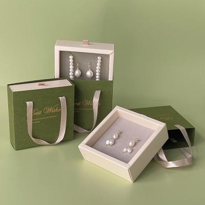 China Custom Luxury Jewelry Ring Set Box Special Paper Printed Jewelry Packaging Box With Handle for sale