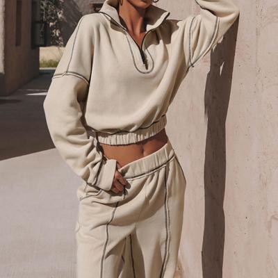 China Anti-wrinkle autumn sports new suit women's fashion leisure half zipper sweater suit lounge use two-piece outfits crop top pants set for sale