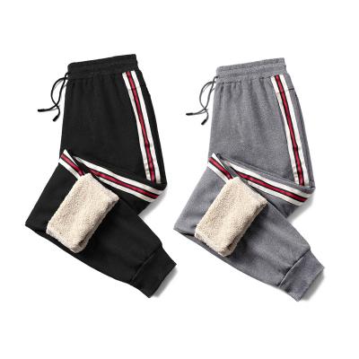 China Anti-wrinkle 2021 winter men's casual sports pants men's loose and warm waist thin pants pants wholesale for sale