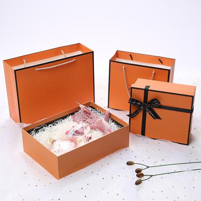 China Large Recyclable Luxury Low Price Orange Romantic Cardboard Gift Box Rigid Packaging for sale