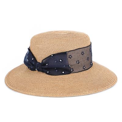 China Sunproof Summer Floppy Beach Wide Brim Straw Hat For Women for sale