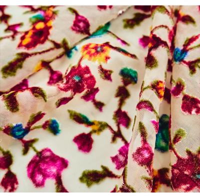 China Viable floral print fabric for dress 2021 2022 animal fabric print velvet burnout fabrics for sale