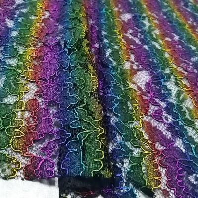 China Viable Fancy Design Multi Color Foil Poly Neon Shinny Rope Lace Dress Fabrics Rainbow Color for sale