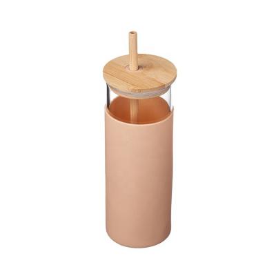 China Sustainable Reusable Glass Water Bottles Lid Glass Bamboo Water Tumbler With Silicone Sleeve And Bamboo Straws for sale