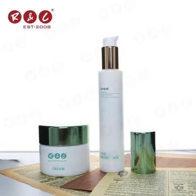 China Custom Luxury Empty White Ceramic Recycled Fancy Cosmetic Packaging Set Makeup Skin Care Glass Pump Bottle 100g 150g 200g for sale