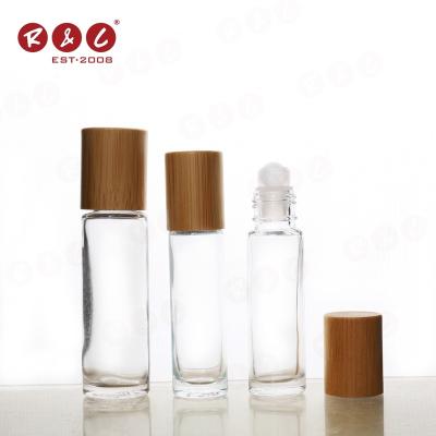 China 10ml Popular Arab Cosmetics 30ml 50ml 90ml Roll On Roll On Clear Glass Bottle Leak Proof Oil Perfume Frosted Wooden Cap for sale