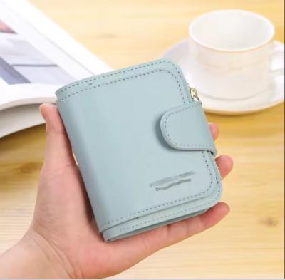 China Ladies Small Wallet PU Leather Small Coin Purse Solid Color Multifunctional Purse for sale