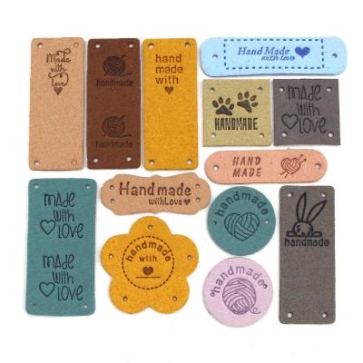 China 20pcs Washable Heart Labels Handmade Mix Colors Handcrafted Flower Leather Labels With Love Tag For Clothes Hats Bags Knitting Accessories for sale