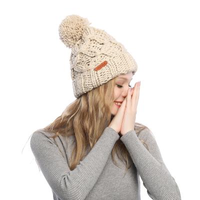 China New autumn and winter women's hat hemp knitted pattern Pom-pom plus winter thickened warm hat for sale