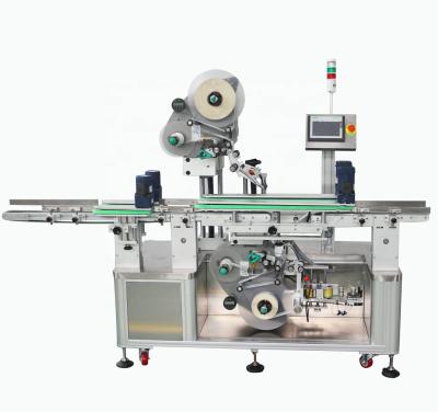 China GARMENT SKILT factory price automatic sticker top and bottom labeling machine for food tray for sale