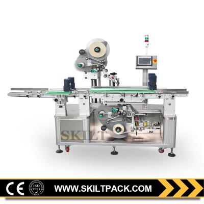 China Automatic CLOTHING Top And Bottom Sticker Labeling Machine On Box Bag Cardboard for sale