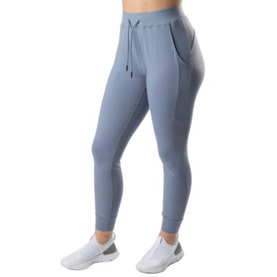 China Custom Soft Nylon Ladies Joggers Anti-Wrinkle Sports Pants Women's Joggers Pants Women's Joggers With Drawstrings for sale